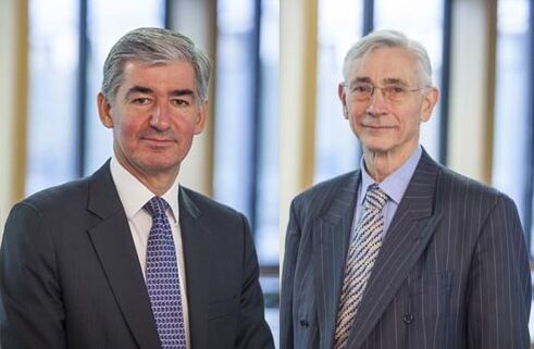 Jonathan Symonds and John Chisholm facing the camera