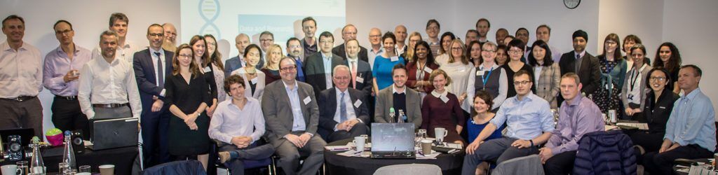 80 members of the Discovery Forum looking at camera